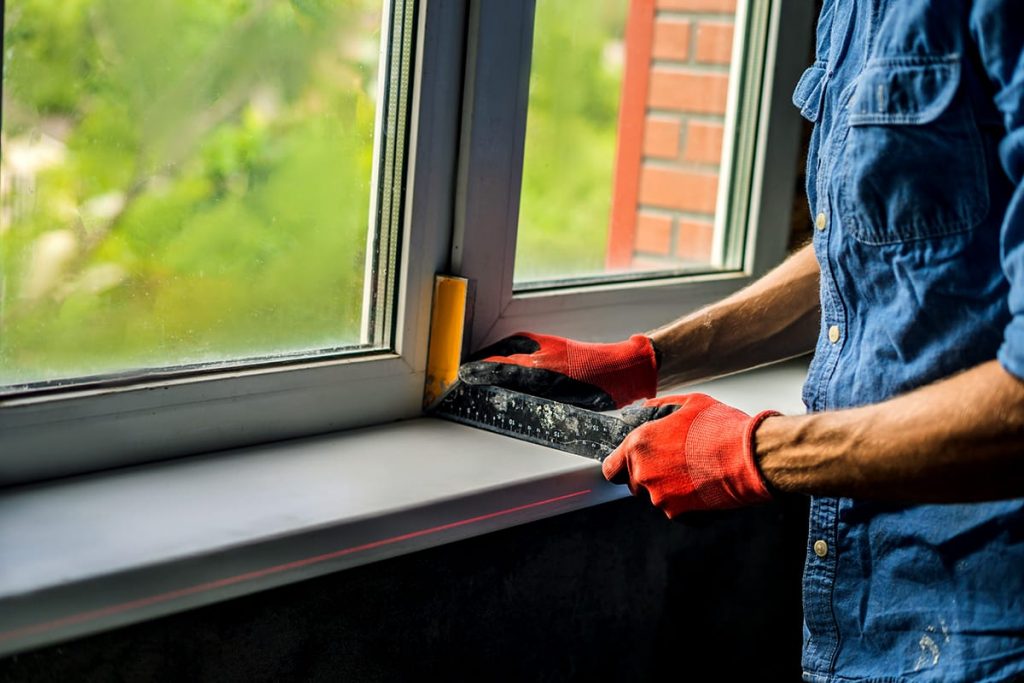 man installing his own windows