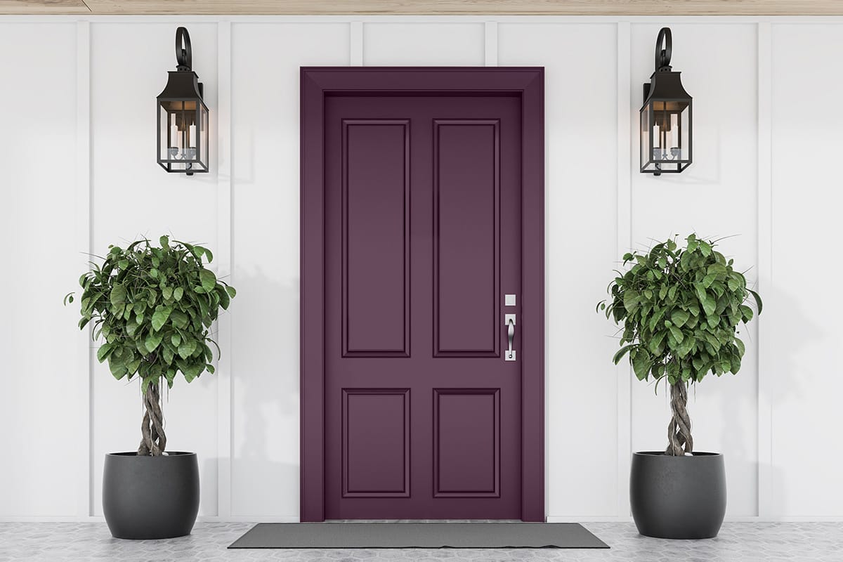 white house with dark purple door